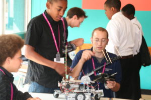 an image of students from the Generating Genius programme being introduced to robotics