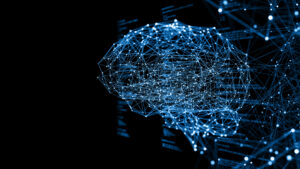 Brain image depicted in linked dots and neurons, and connected to a computer mainframe